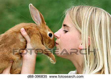 Girl with rabbit View Large Photo Image Stock Photography - Girl with rabbit. Fotosearch
