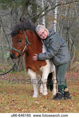 Stock Photography - Girl with Shetland Pony. Fotosearch