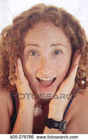 Stock Photograph - Girl with shocked expression. Fotosearch
