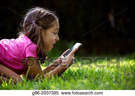 girl with smartphone. View Large Photo Image Stock Photography - girl with smartphone.. Fotosearch
