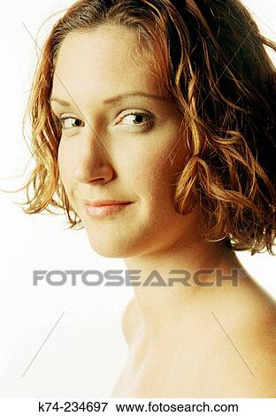 Girl with smile looking at camera View Large Photo Image Stock Photo - Girl with smile looking at camera. Fotosearch
