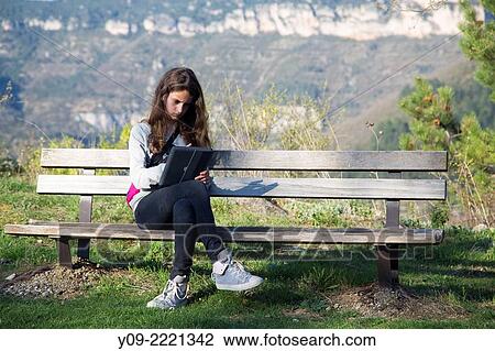 Girl with tablet. View Large Photo Image Stock Image - Girl with tablet.. Fotosearch