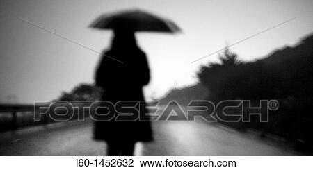 Girl with umbrella, Viscaya, Spain View Large Photo Image Stock Image - Girl with umbrella, Viscaya, Spain. Fotosearch