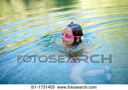 girl with underwater glasses swimming on a river, Villahermosa river, Ludiente, Castell? n, Spain View Large Photo Image Stock Image - girl with underwater glasses swimming on a river, Villahermosa river, Ludiente, Castell? n, Spain. Fotosearch