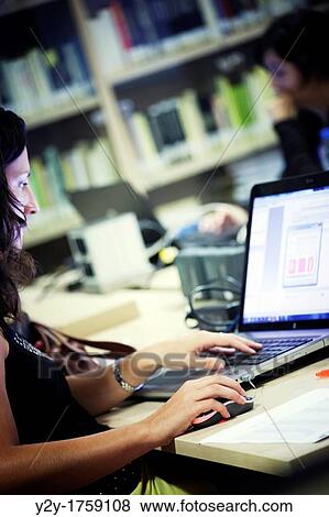 Girl working with computer View Large Photo Image Stock Photo - Girl working with computer. Fotosearch