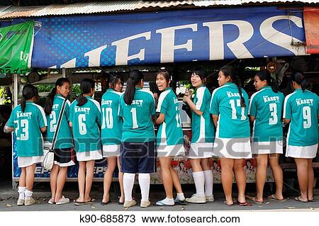 Girls from a local sports club getting their lunch at a food stall, Bangkok, Thailand, Southeast Asia View Large Photo Image Stock Image - Girls from a local sports club getting their lunch at a food stall, Bangkok, Thailand, Southeast Asia. Fotosearch