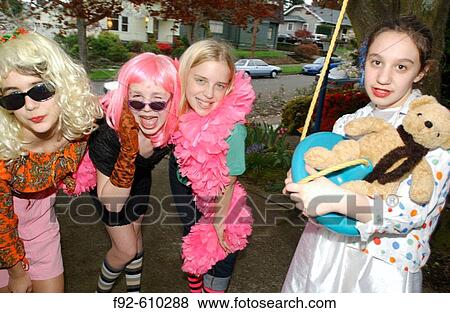 Stock Photo - Girls in costumes. Fotosearch