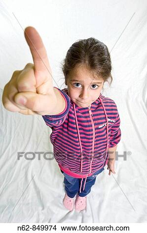 Girls in full view from the figure with the raised arm and the hand that indicates View Large Photo Image Picture - Girls in full view from the figure with the raised arm and the hand that indicates. Fotosearch