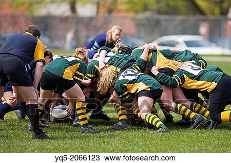 Stock Image - girls in rugby scrum, Canada, Ontario. Fotosearch