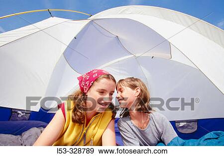 Girls in tent View Large Photo Image Stock Photo - Girls in tent. Fotosearch
