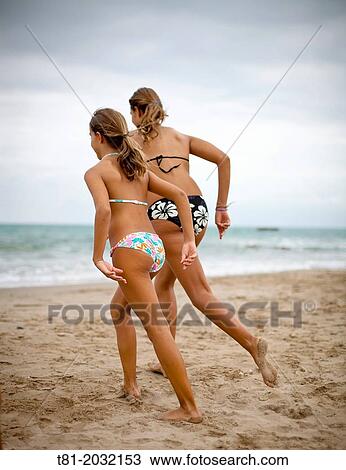 Girls on Beach, Denia, Valencian community, Spain View Large Photo Image Stock Image - Girls on Beach, Denia, Valencian community, Spain. Fotosearch