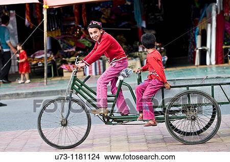 girls on their cycle. View Large Photo Image Picture - girls on their cycle.. Fotosearch