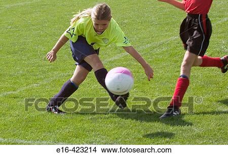 girl's soccer game kick View Large Photo Image Picture - girl's soccer game kick. Fotosearch