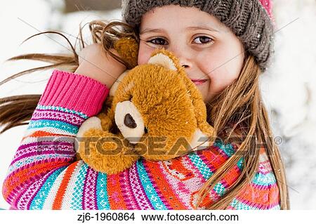 Picture - Girly holding a teddy bear.. Fotosearch