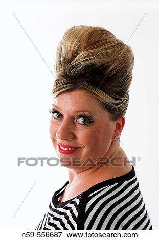 Glamourous woman with 1950s style beehive hairstyle. View Large Photo Image Stock Photo - Glamourous woman with 1950s style beehive hairstyle.. Fotosearch
