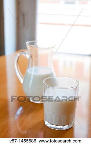 Glass and jug of milk View Large Photo Image Stock Photograph - Glass and jug of milk. Fotosearch