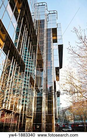Glass building at intersection of Tottenham Court Road and Hampstead Road and Euston Road, London, UK View Large Photo Image Stock Image - Glass building at intersection of Tottenham Court Road and Hampstead Road and Euston Road, London, UK. Fotosearch