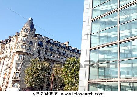 Glass exterior of a modern office building, Paris, France. View Large Photo Image Stock Photo - Glass exterior of a modern office building, Paris, France.. Fotosearch