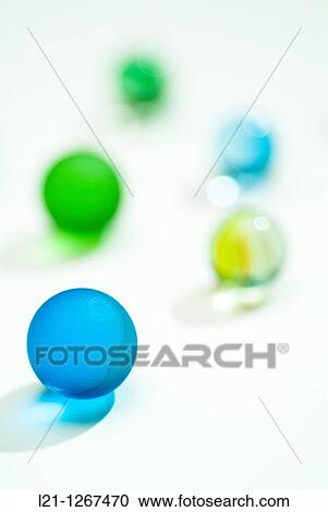 Glass marbles on white background. View Large Photo Image Stock Image - Glass marbles on white background.. Fotosearch