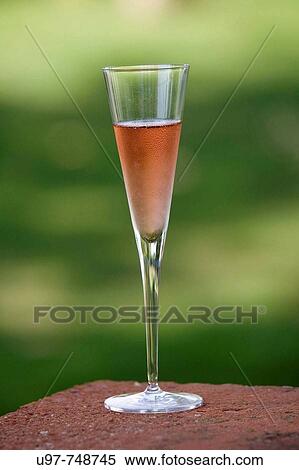 Stock Photography - Glass of? cava?, Catalan pink sparkling wine. Fotosearch