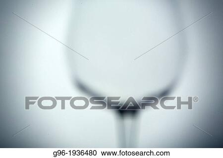 Stock Image - glass of wine out of focus.. Fotosearch