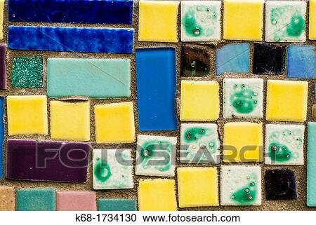 Stock Image - Glass tiles on a bench. Fotosearch