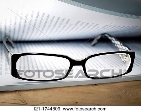 Glasses and book. View Large Photo Image Stock Photo - Glasses and book.. Fotosearch