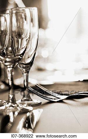 Glasses and silverware at a wedding reception. Moret-sur-Loing near Paris. France View Large Photo Image Stock Image - Glasses and silverware at a wedding reception. Moret-sur-Loing near Paris. France. Fotosearch