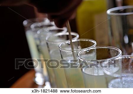 glasses of absinthe, Distillery Pierre Guy, Pontarlier, Doubs departement, Franche-Comte region, France Europe View Large Photo Image Stock Photo - glasses of absinthe, Distillery Pierre Guy, Pontarlier, Doubs departement, Franche-Comte region, France Europe. Fotosearch