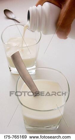 Glasses of milk View Large Photo Image Stock Photo - Glasses of milk. Fotosearch