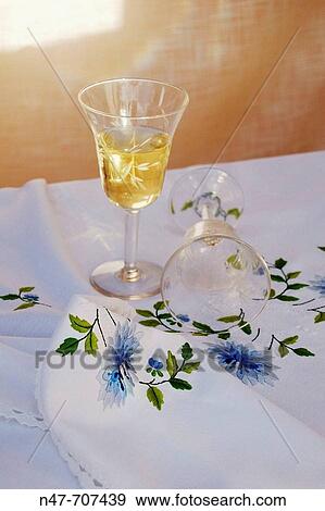 Glasses on embroidered tablecloth View Large Photo Image Stock Photo - Glasses on embroidered tablecloth. Fotosearch