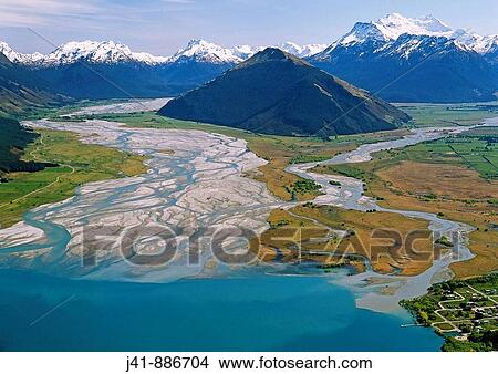 Glenorchy with Dart River mouth left and Mt Earnslaw 2819 m right aerial view from over Lake Wakatipu New Zealand View Large Photo Image Picture - Glenorchy with Dart River mouth left and Mt Earnslaw 2819 m right aerial view from over Lake Wakatipu New Zealand. Fotosearch