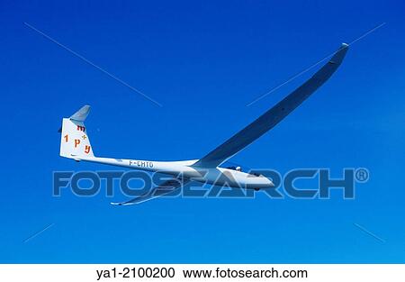 Glider plane Duo Discus flying, Aragon, Spain. View Large Photo Image Stock Image - Glider plane Duo Discus flying, Aragon, Spain.. Fotosearch