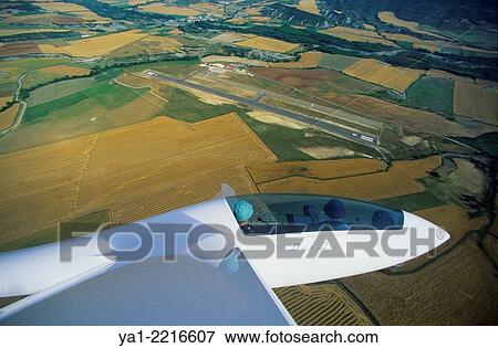Glider plane Duo Discus flying over aerodrome of Santa Cilia de Jaca, Aragon, Spain. View Large Photo Image Stock Photo - Glider plane Duo Discus flying over aerodrome of Santa Cilia de Jaca, Aragon, Spain.. Fotosearch