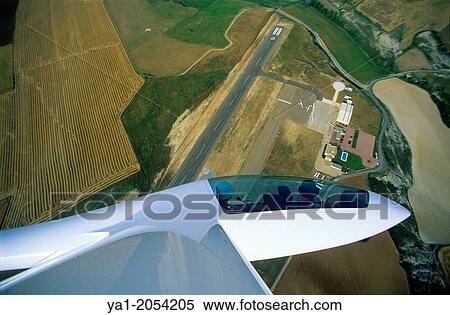Glider plane Duo Discus flying over aerodrome of Santa Cilia de Jaca, Aragon, Spain. View Large Photo Image Stock Photography - Glider plane Duo Discus flying over aerodrome of Santa Cilia de Jaca, Aragon, Spain.. Fotosearch