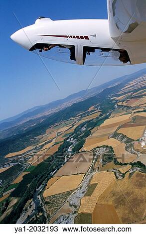 Stock Image - Glider plane Twin Astir in aerobatic flight near Santa Cilia de Jaca, Aragon, Spain.. Fotosearch