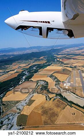 Glider plane Twin Astir in aerobatic flight near Santa Cilia de Jaca, Aragon, Spain. View Large Photo Image Stock Image - Glider plane Twin Astir in aerobatic flight near Santa Cilia de Jaca, Aragon, Spain.. Fotosearch