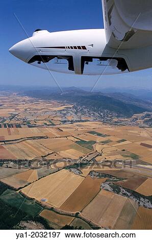 Glider plane Twin Astir in aerobatic flight near Santa Cilia de Jaca, Aragon, Spain. View Large Photo Image Stock Photo - Glider plane Twin Astir in aerobatic flight near Santa Cilia de Jaca, Aragon, Spain.. Fotosearch