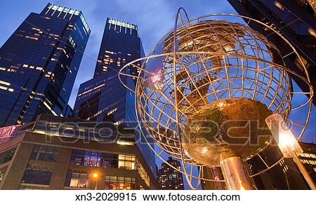 Stock Image Of Globe Sculpture In Front Trump International Hotel Globe Sculpture In Front Of Trump International Hotel And Tower At Left Time Warner Center Columbus Circle Midtown Manhattan New York City Usa