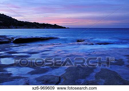 Stock Photo - Gnejna Bay at sunset, Mgarr, Malta, Europe, november 2009. Fotosearch