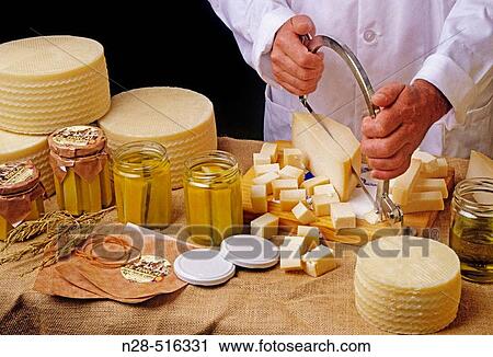 Goat cheese in oil olive with thyme View Large Photo Image Stock Image - Goat cheese in oil olive with thyme. Fotosearch