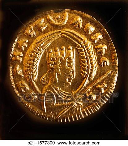 Stock Image - Gold coin of Ezana (c. 340 AD), Museum of Axum, Ethiopia. Fotosearch