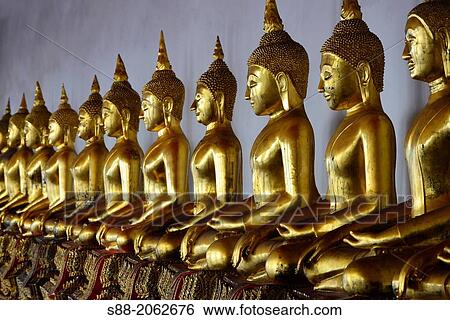 Golden Buddha at Wat pho temple which is one of the biggest temple in Bangkok. There are more than 1, 000 Buddha images in these temple. View Large Photo Image Stock Photograph - Golden Buddha at Wat pho temple which is one of the biggest temple in Bangkok. There are more than 1, 000 Buddha images in these temple.. Fotosearch