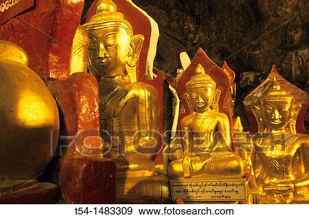 Stock Photo - Golden Buddha statues in the Pindaya cave in Myanmar. Fotosearch