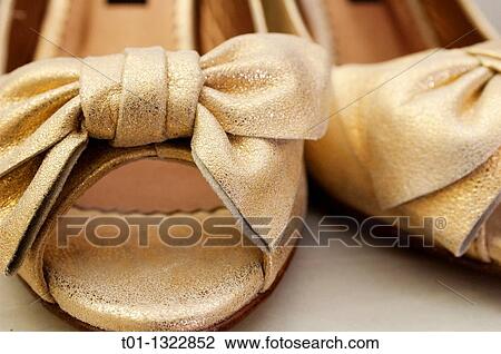 Golden wedding shoes View Large Photo Image Stock Image - Golden wedding shoes. Fotosearch
