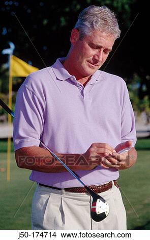 Golf, cheking score View Large Photo Image Picture - Golf, cheking score. Fotosearch