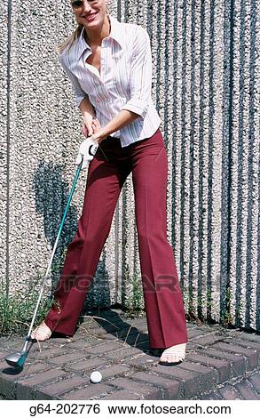 Stock Photograph - Golf in the city. Fotosearch