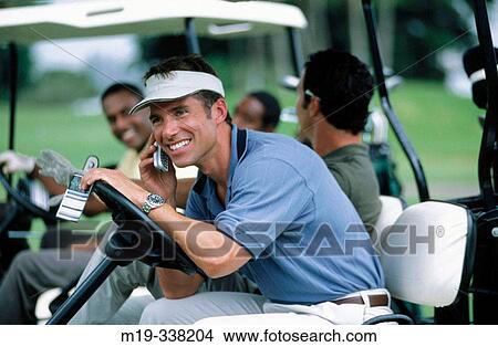 Picture - golfer on cellular. Fotosearch