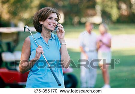 Golfer on cellular View Large Photo Image Stock Image - Golfer on cellular. Fotosearch