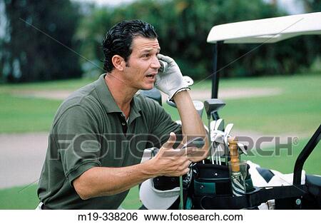 Stock Photograph - golfer on cellular. Fotosearch
